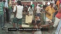 Bangladesh buries victims from garment... - no comment