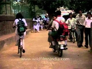 School girls cycle to class in India!