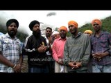 Sikh devotees singing spiritual songs during Sri Hemkunt Sahib Yatra