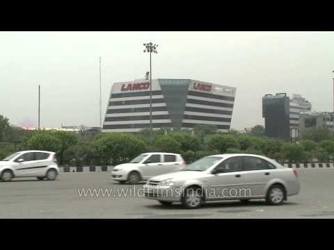 Lanco Infratech: Gurgaon skyline and fast traffic: Delhi Gurgaon toll