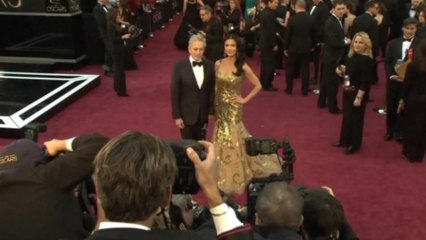 Douglas, Zeta-Jones separate; Clooney, Bullock open Venice