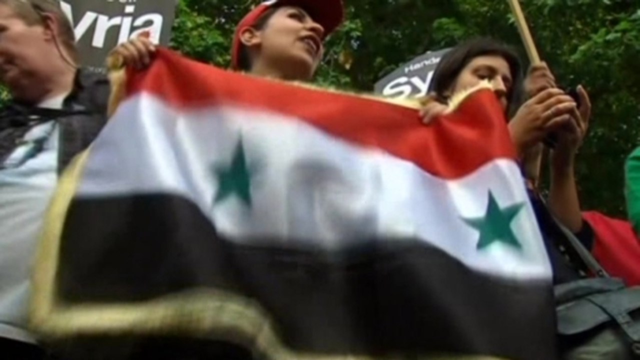 Protesters gather outside Downing Street to oppose Syria intervention