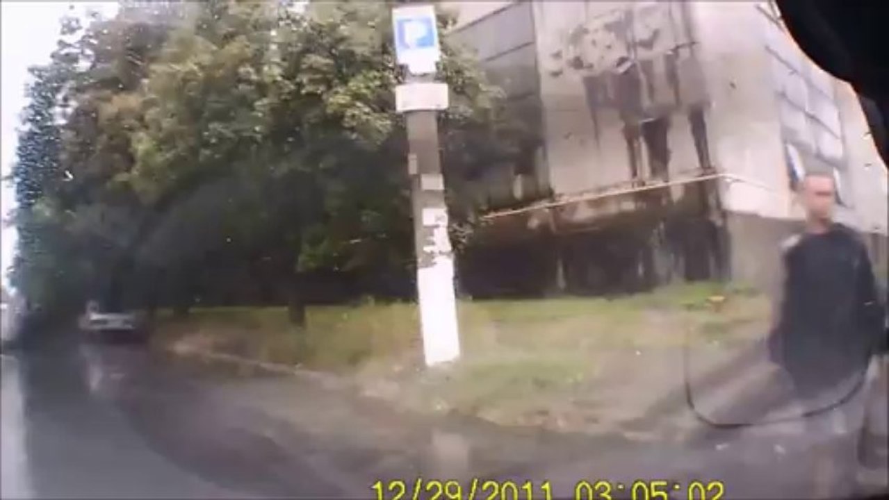 Dramatic Video Shows Van Slamming Into Open Manhole