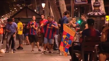 Fans celebrate Barça's hard-fought Super Cup title win