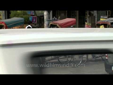 Rickshaw-pullers waiting for passenger outside GTB Nagar metro station