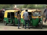 Auto rickshaws waiting for commuters at  Netaji Subhash Place metro station