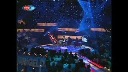 Ugur isilak-Gözlerin..ƎT