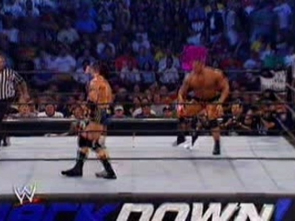 Batista does a Spinebuster to Orton