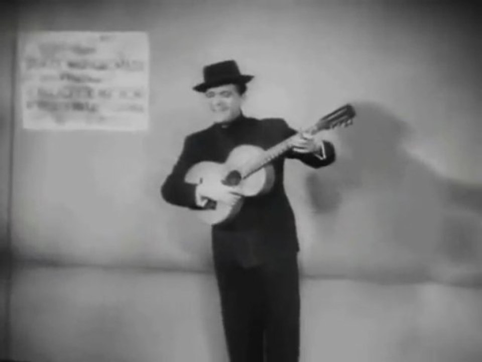 Eugeniusz Bodo -- Już taki jestem zimny drań (kadry z filmu -- „Pieśniarz Warszawy" 1934 r.)