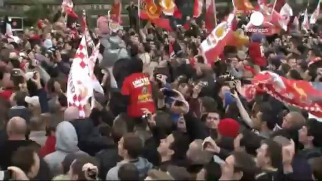 Manchester United victory parade turns city red