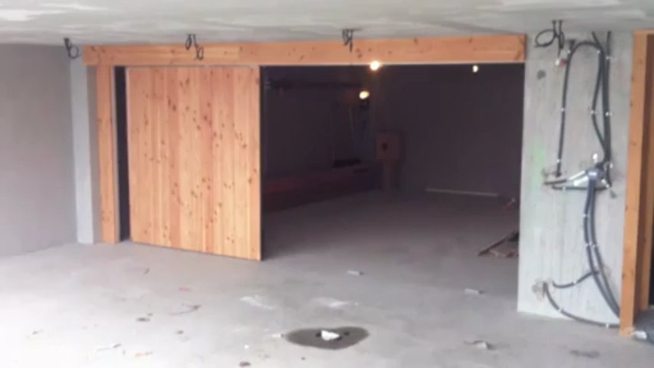 stores et fermetures du prarion - porte de garage sectionnelle latérale 1