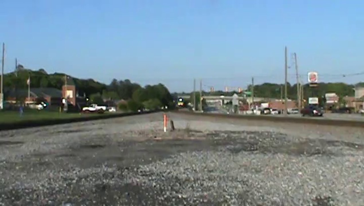 Norfolk Southern empty well and autorack train west through Austell Ga.