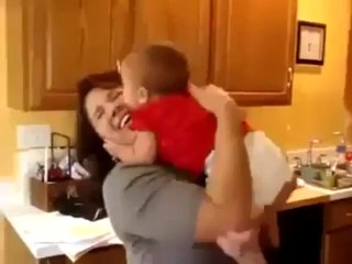 Funny baby kissing attack on mom