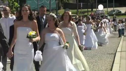 Nice day for a mass white wedding in Serbia