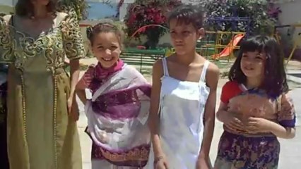 عرض أزياء تقليدية بمناسبة تتويج نشاط شهر التراث