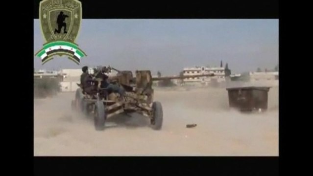 Fighting rages in strategic Syrian town