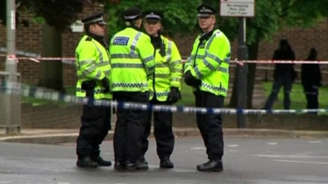 Police search homes after British soldier's murder