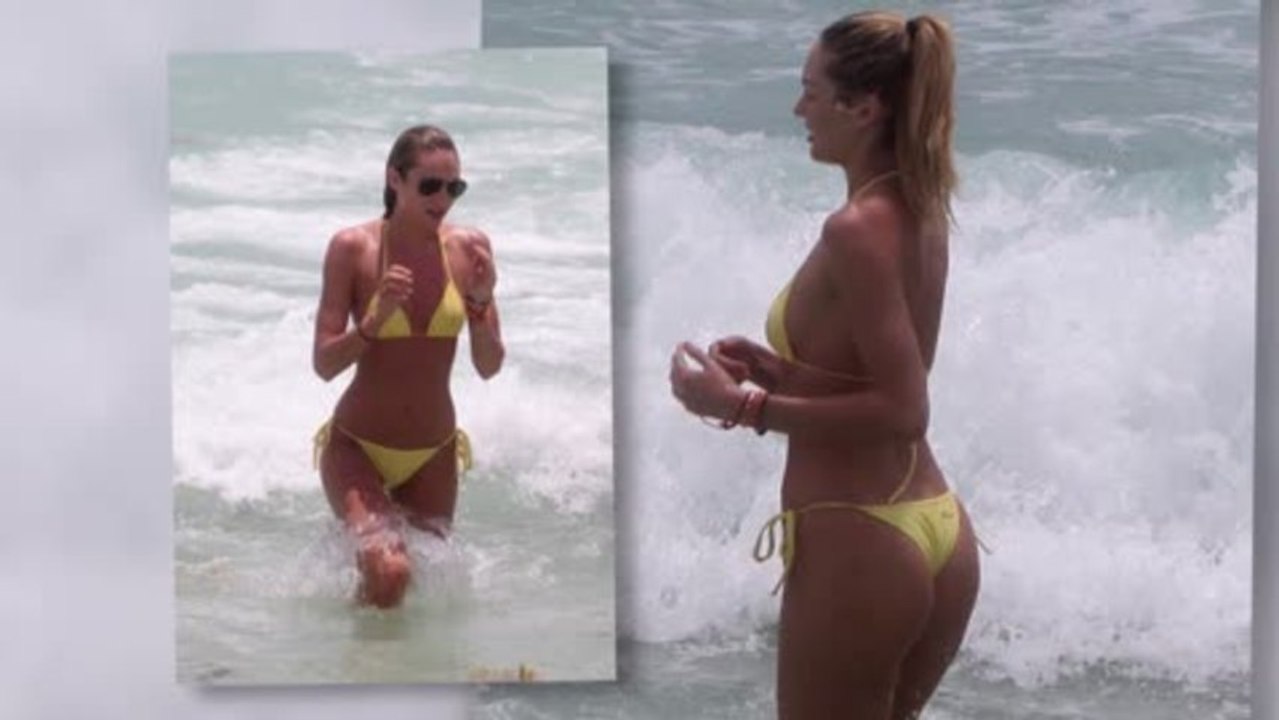 Candice Swanepoel Wows in a Tiny Yellow String Bikini