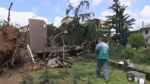 Lorries overturned as rare tornado hits Milan