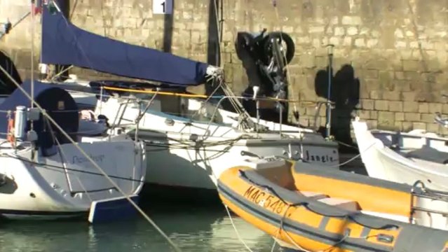 Yamaha fjr 1300 falls inisde the boat on harbour