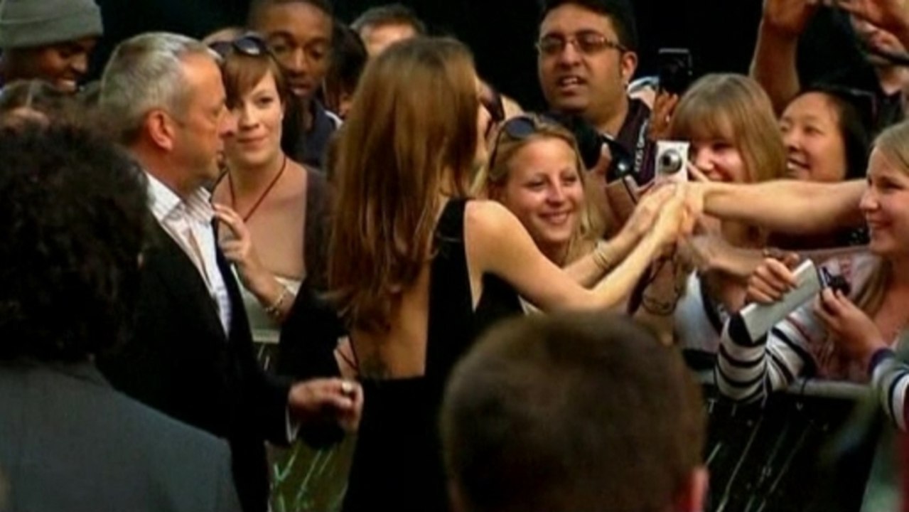 Jolie walks red carpet, Kardashian having a girl