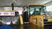 Bus trapped as torrential rain rises in China