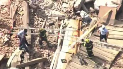 Collapsed building in Philadelphia traps several people