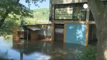 Prague residents assess flood damage as water recedes