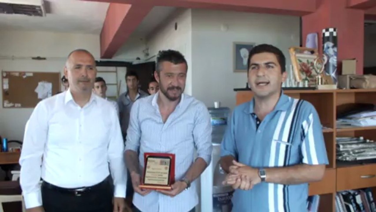 YILIN ANTRENÖRÜ MUHSİN AYDIN VE TÜMER METİN
