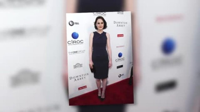 Michelle Dockery Shows Off Her Figure in Purple For Downton Abbey Event