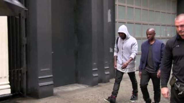 Kanye West Snaps at Photographer While in New York