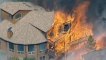 US wildfires destroy scores of homes