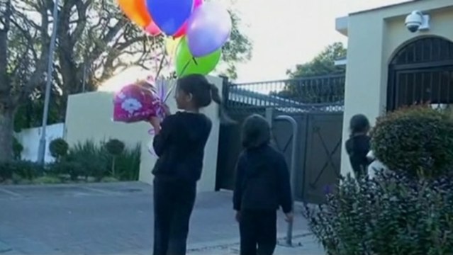 Flowers and balloons for Mandela
