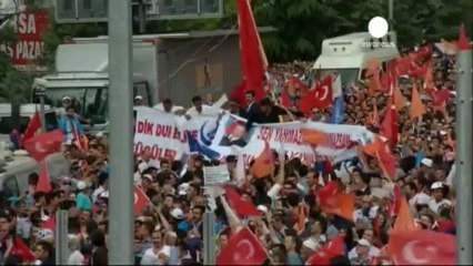 Turkish prime minister defiant at rally