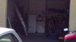 Porte de garage Secura de chez Normstahl, finition micro, grise RAL 7016 motorisée et posée par APG Accès Portes de Garage