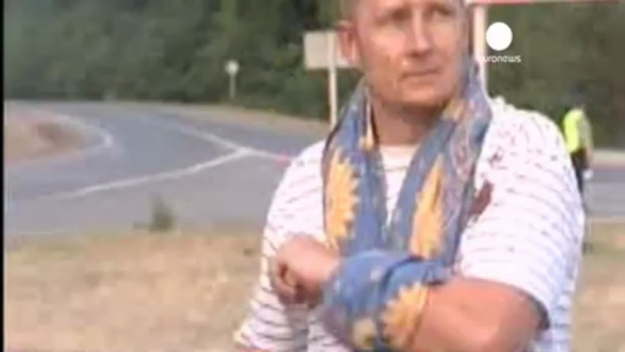 Thousands are evacuated as exploding shells rock a...