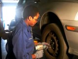 Changing the tire using the tire changer and tire balancing machine 2