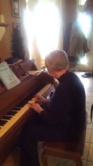 Grandmother with advanced Alzheimer's disease comes to life in front of a piano