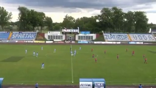 Female football player scores goal from halfway line