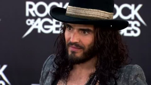 Russell Brand Hit on and Got Denied by Mila Kunis
