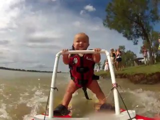 Seven-month-old baby goes waterskiing