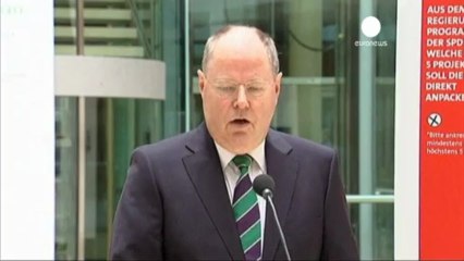 Merkel puts families at heart of re-election bid