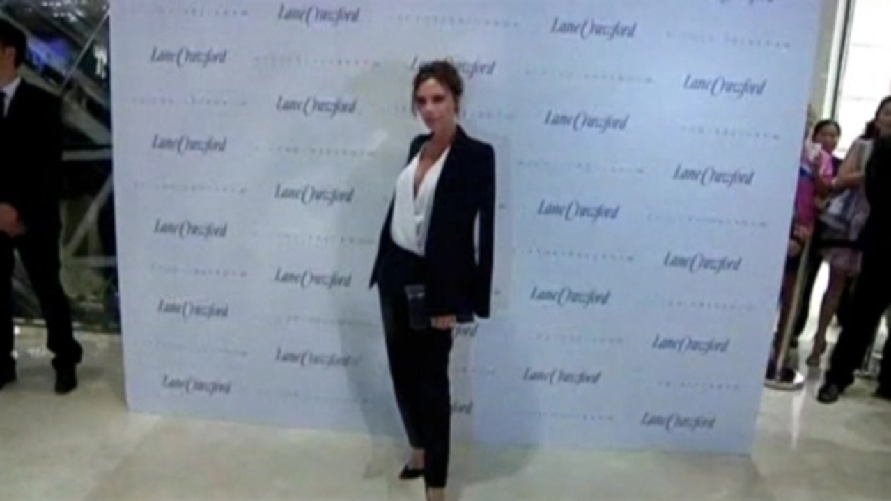 Victoria Beckham delights fans in China