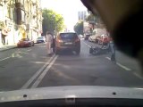 Motorcycle Driver Crashes Into a Car Door
