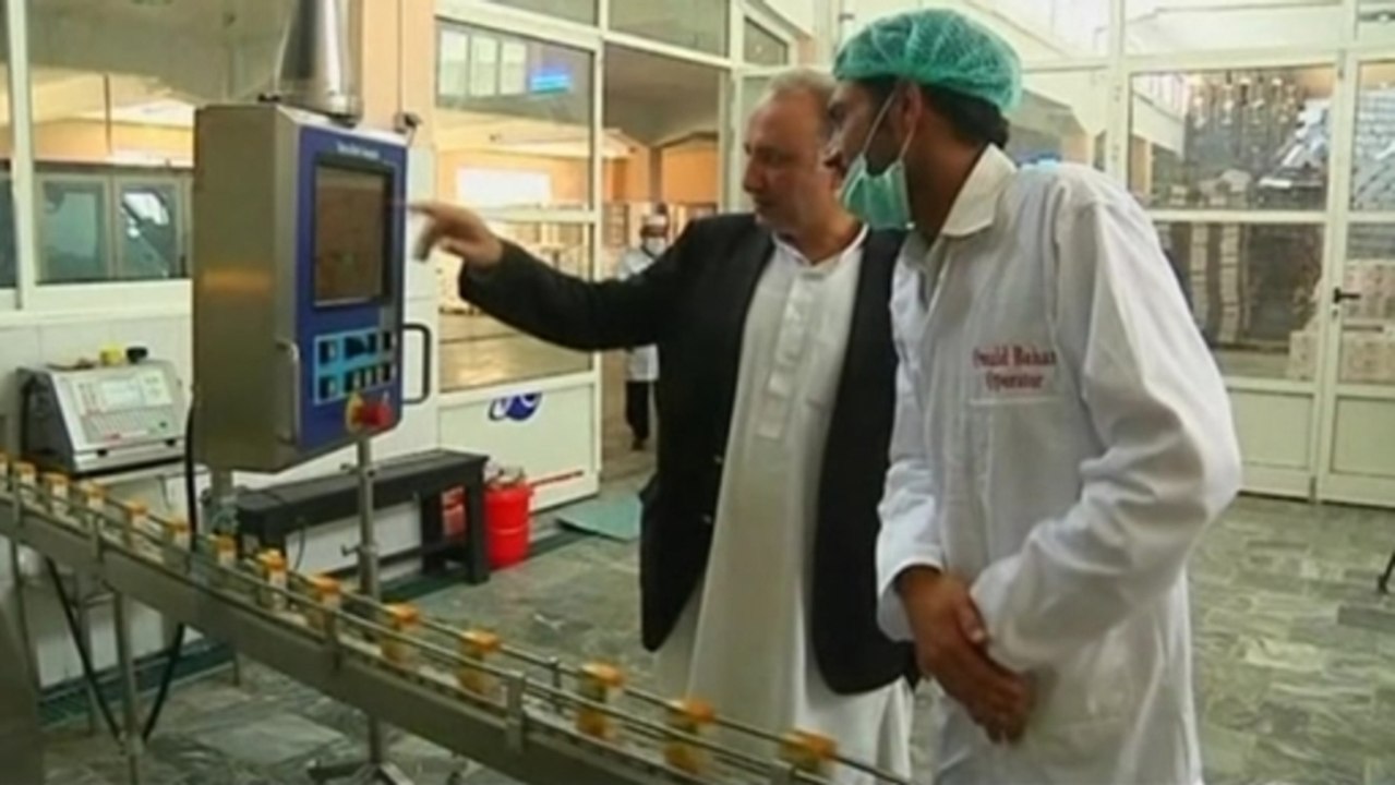 Afghan businesses wary over peace talks and tro...