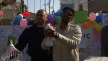 S African man releases doves for Mandela