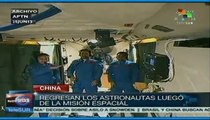 Regresan astronautas chinos después de completar misión espacial