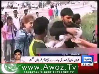 Imran Khan distributed mangoes among poor people which were sent to him as gift by Zardari