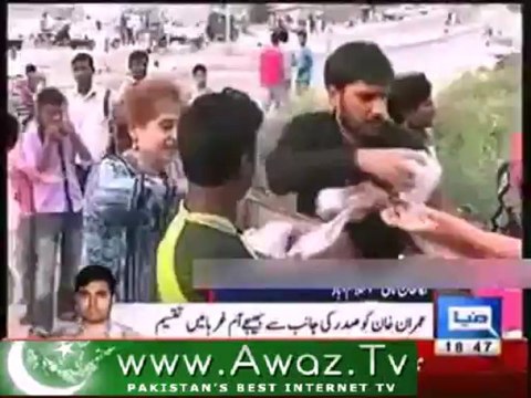 Imran Khan distributed mangoes among poor people which were sent to him as gift by Zardari