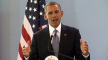 Obama praises gay marriage ruling; lauds Mandela
